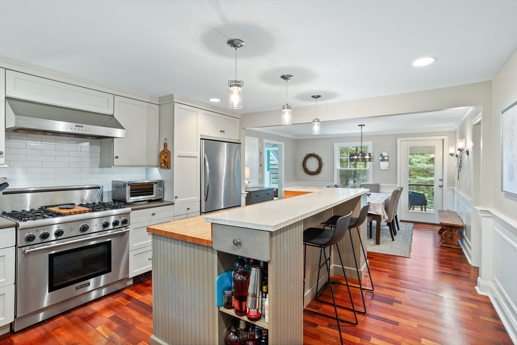 40 Richardson Road Boxborough, MA 01719 - Photo 7 of 39 a kitchen with stainless steel appliances granite countertop a stove and a refrigerator