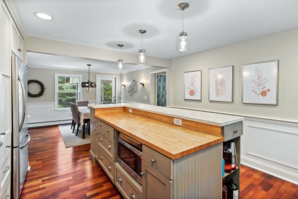 40 Richardson Road Boxborough, MA 01719 - Photo 8 of 39 a room with stainless steel appliances granite countertop a stove and a wooden floors