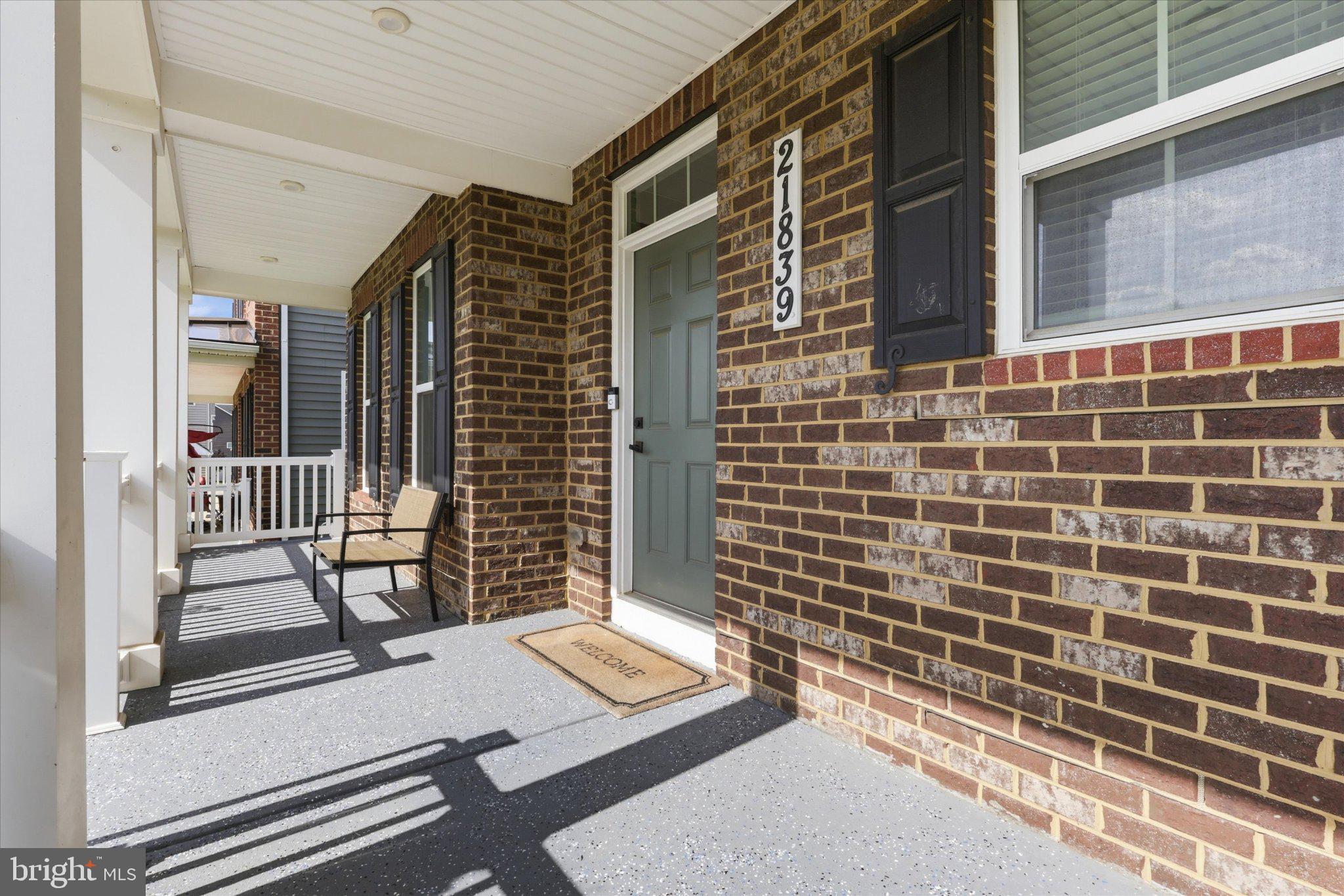 21839 Clarksburg Road Clarksburg, MD 20841 - Photo 4 of 39 Inviting entrance with charming brickwork.