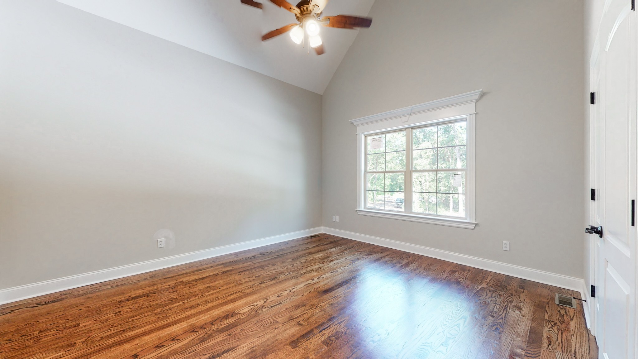 3191 B Greens Mill Road Spring Hill, TN 37174 - Photo 17 of 50 wooden floor in an empty room with a window