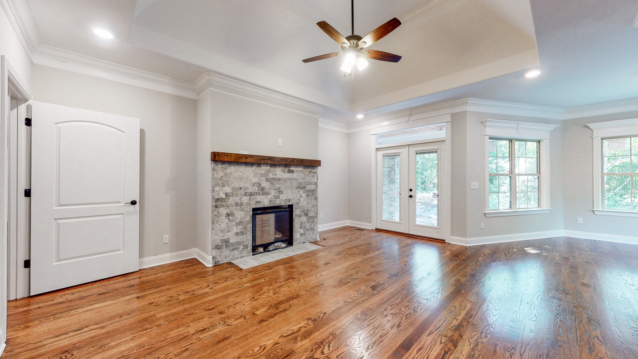3191 B Greens Mill Road Spring Hill, TN 37174 - Photo 20 of 50 a view of an empty room with wooden floor and a window