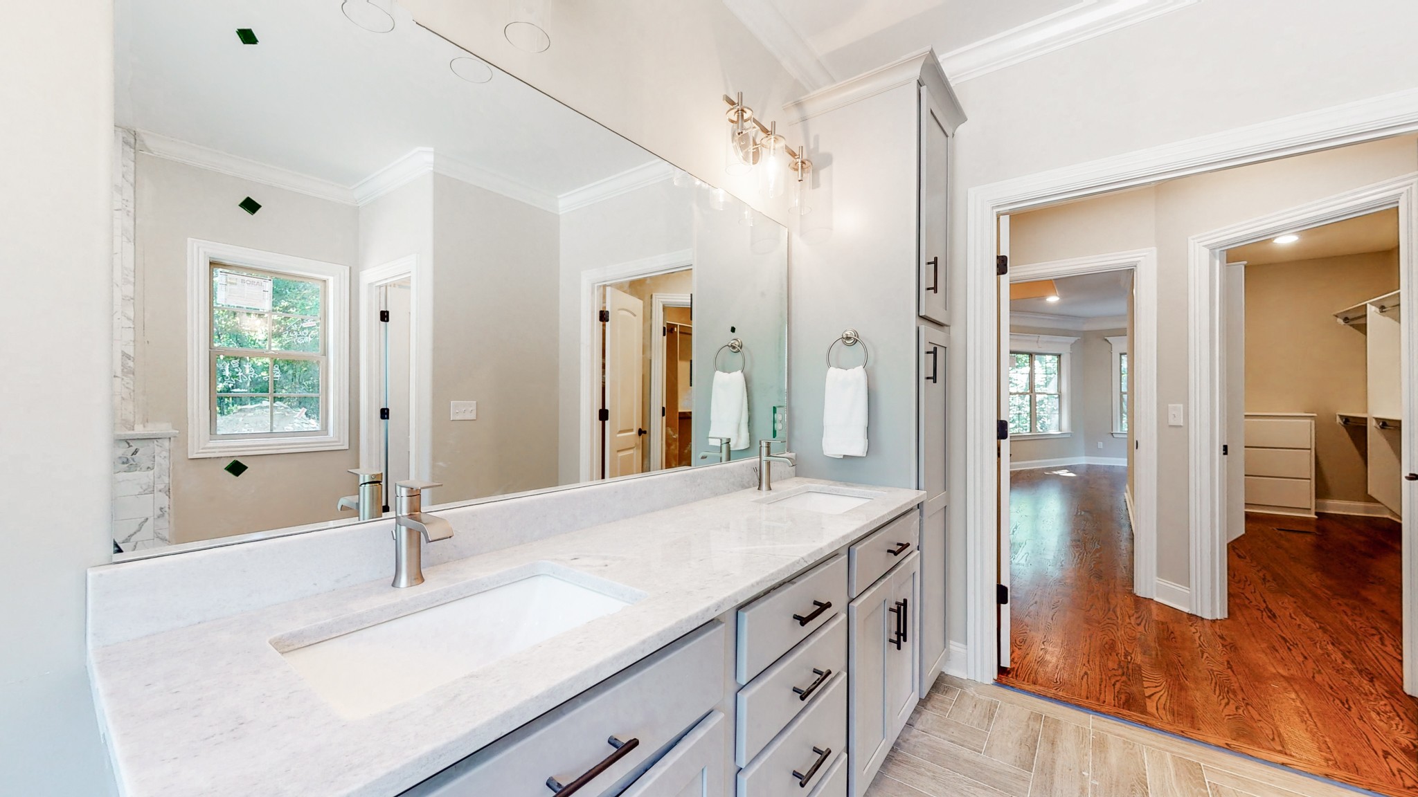 3191 B Greens Mill Road Spring Hill, TN 37174 - Photo 24 of 50 a spacious bathroom with a shower sink and a mirror