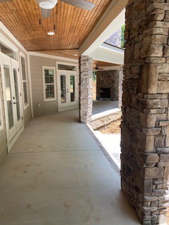 3191 B Greens Mill Road Spring Hill, TN 37174 - Photo 27 of 50 a view of livingroom with an empty space and a fireplace