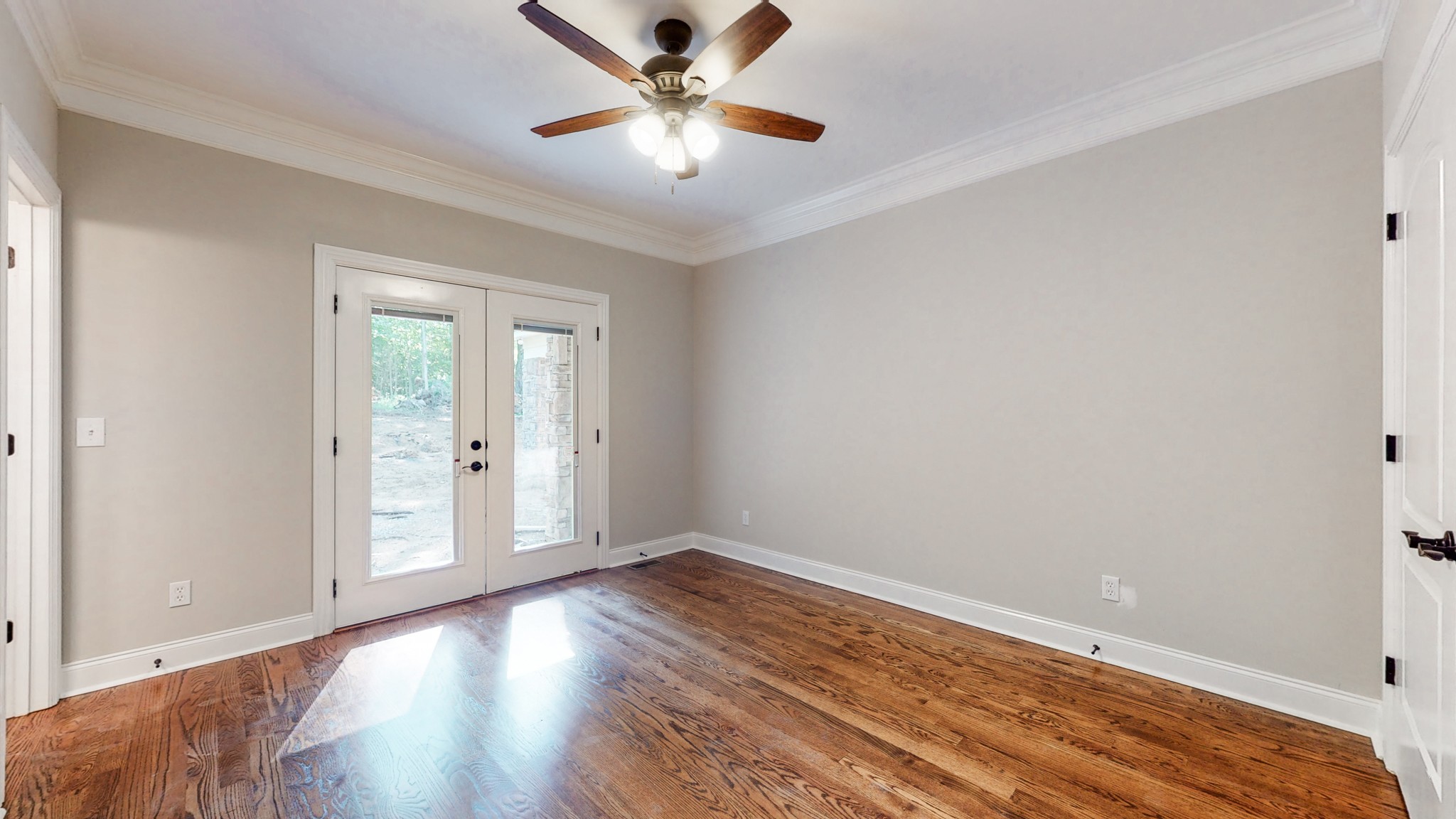 3191 B Greens Mill Road Spring Hill, TN 37174 - Photo 28 of 50 a view of empty room with wooden floor and fan