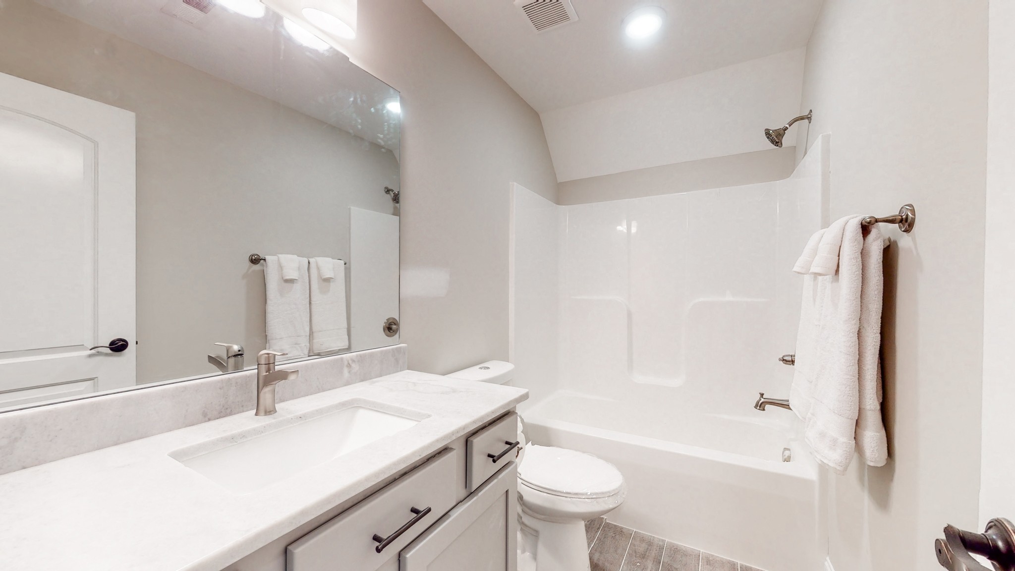 3191 B Greens Mill Road Spring Hill, TN 37174 - Photo 36 of 50 a bathroom with a sink a toilet and shower
