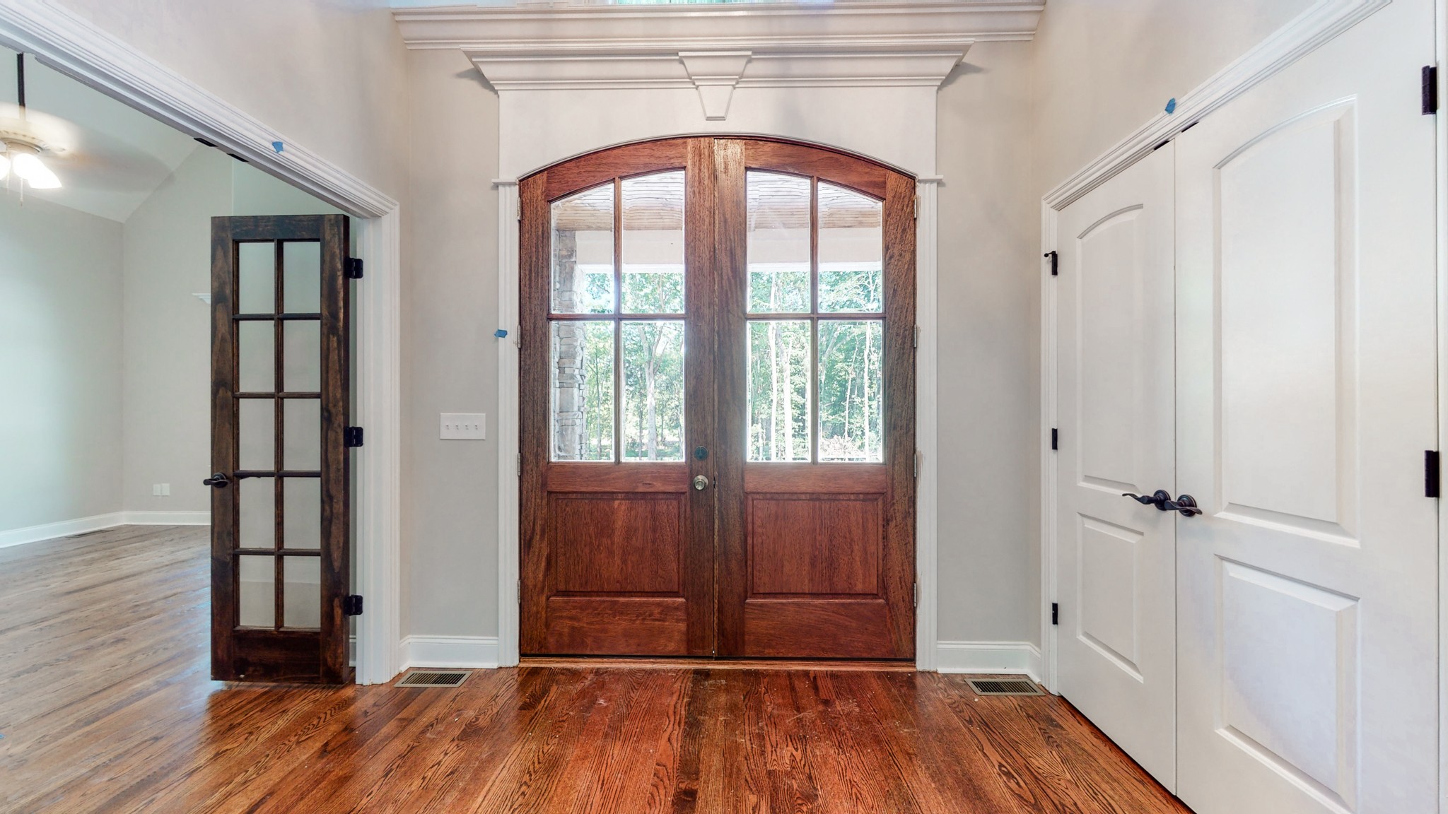 3191 B Greens Mill Road Spring Hill, TN 37174 - Photo 4 of 50 an empty room with wooden floor and a window