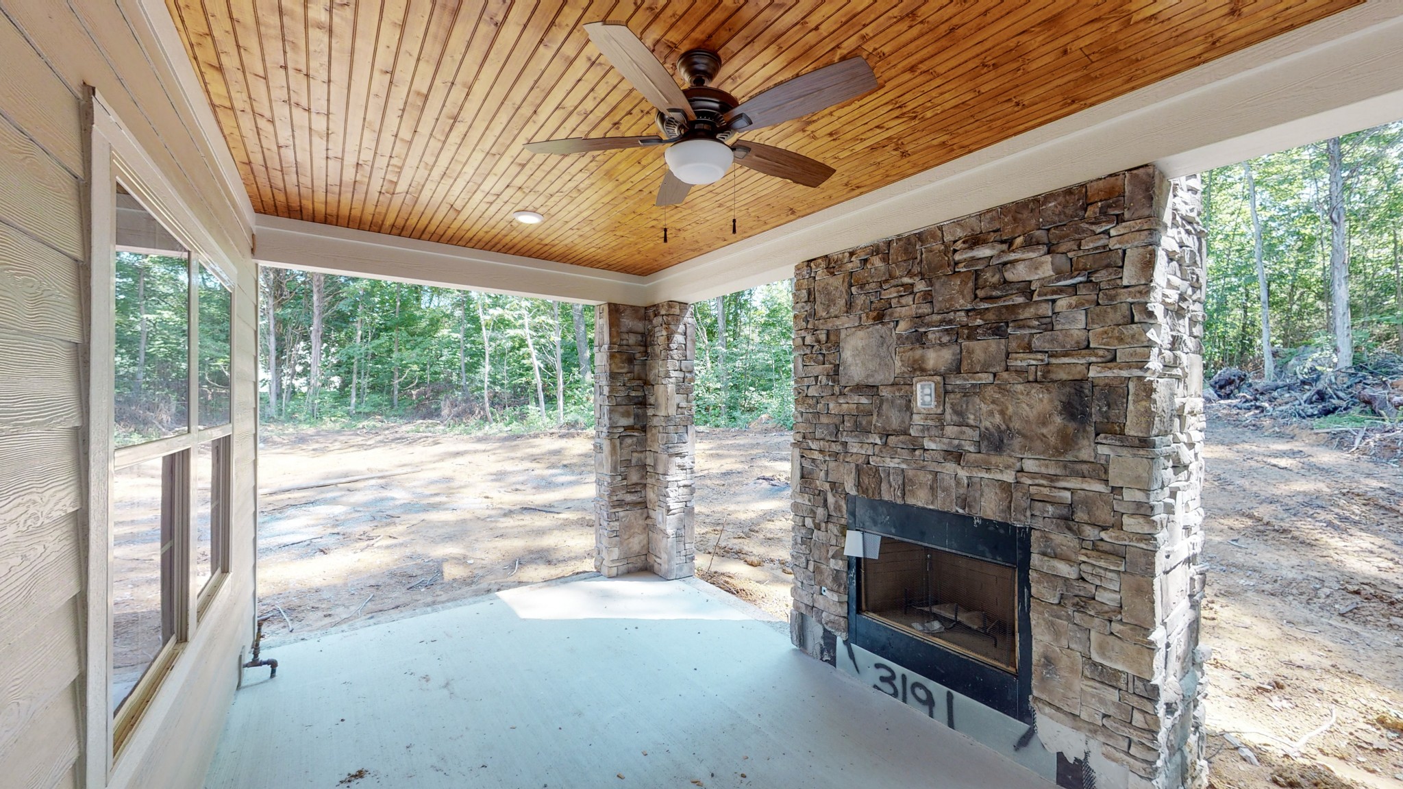 3191 B Greens Mill Road Spring Hill, TN 37174 - Photo 46 of 50 a living room with furniture and a fireplace