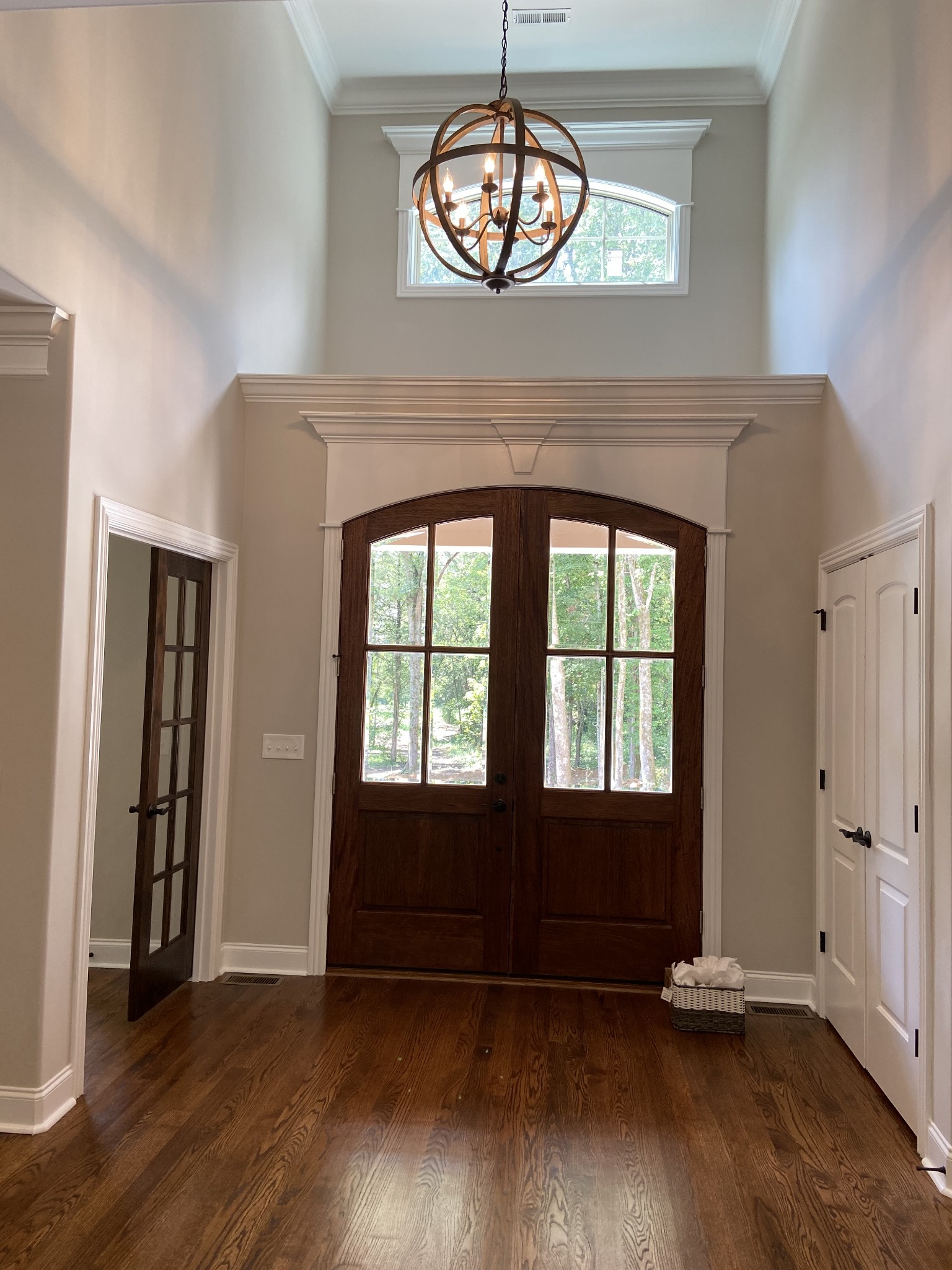 3191 B Greens Mill Road Spring Hill, TN 37174 - Photo 50 of 50 an empty room with wooden floor cabinet and windows