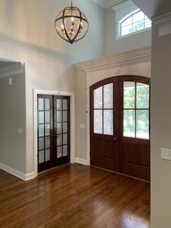 3191 B Greens Mill Road Spring Hill, TN 37174 - Photo 6 of 50 an empty room with wooden floor and windows