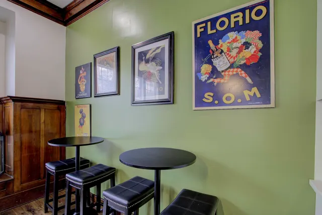 a view of a room with furniture and walls