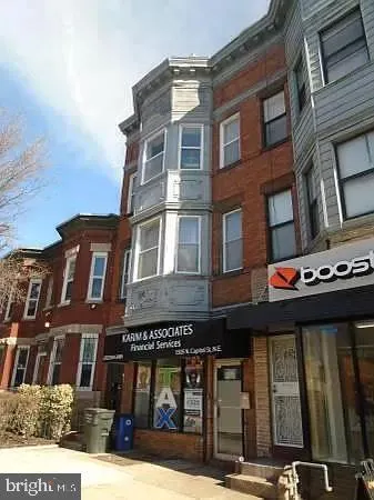 a front view of a building with glass windows