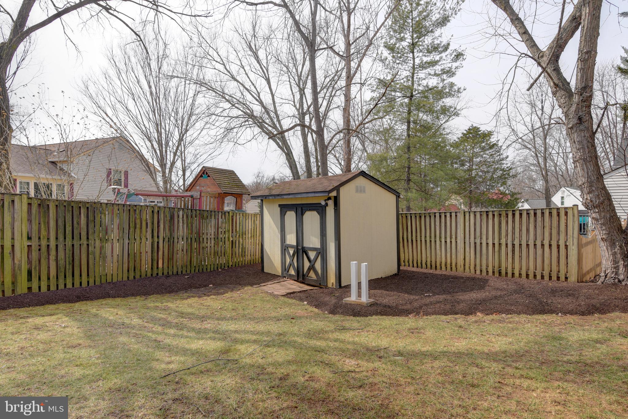 1522 Coat Ridge Road Herndon, VA 20170 - Photo 26 of 41 View from Lower Level Patio of Yard and Shed.