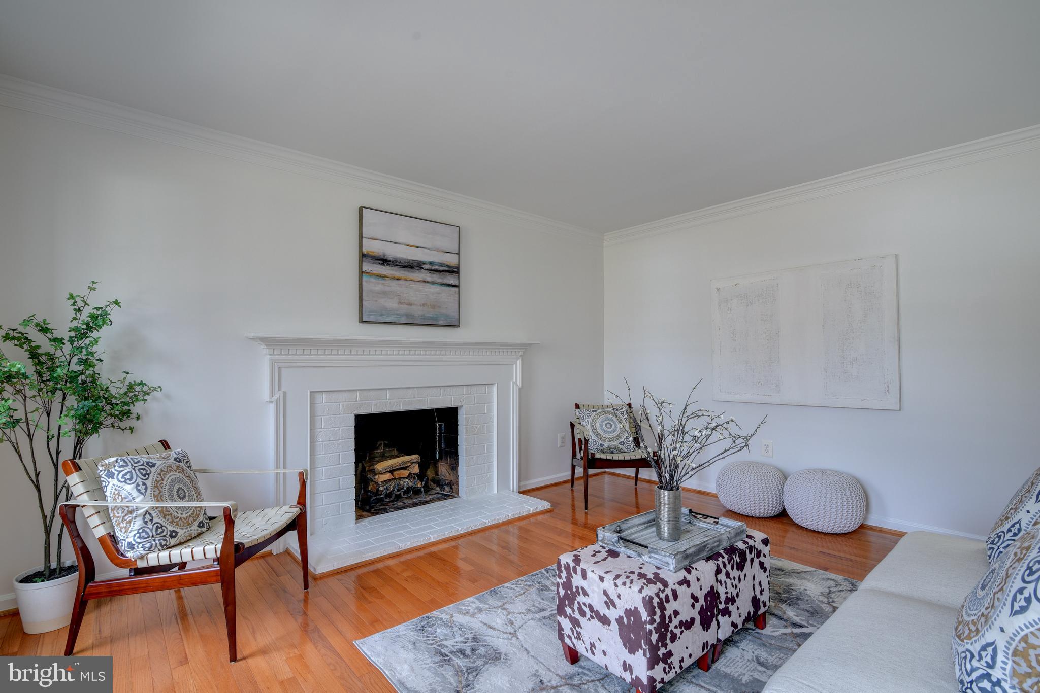 1522 Coat Ridge Road Herndon, VA 20170 - Photo 4 of 41 Living Room with Wood Burning Fireplace