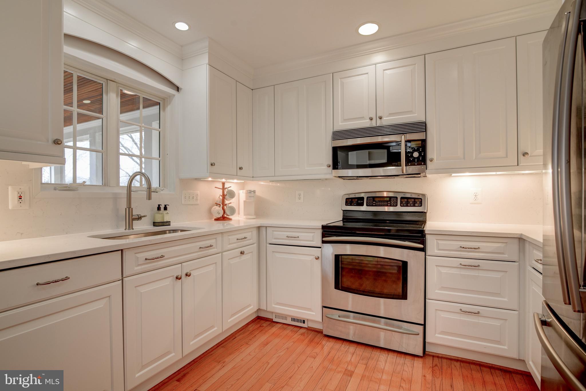 1522 Coat Ridge Road Herndon, VA 20170 - Photo 7 of 41 Remodeled White Kitchen. Overlooking Screen Porch