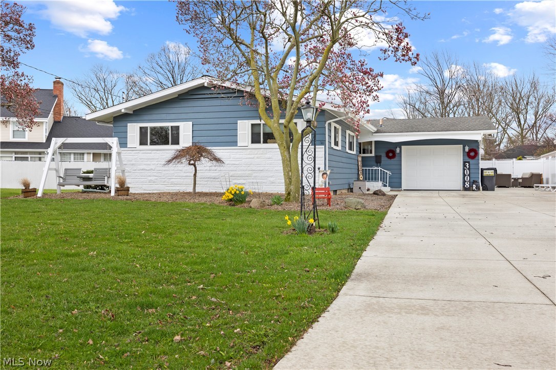 3008 Merriweather Road Sandusky, OH 44870 - Photo 2 of 37 View of front of house featuring a front yard and a garage