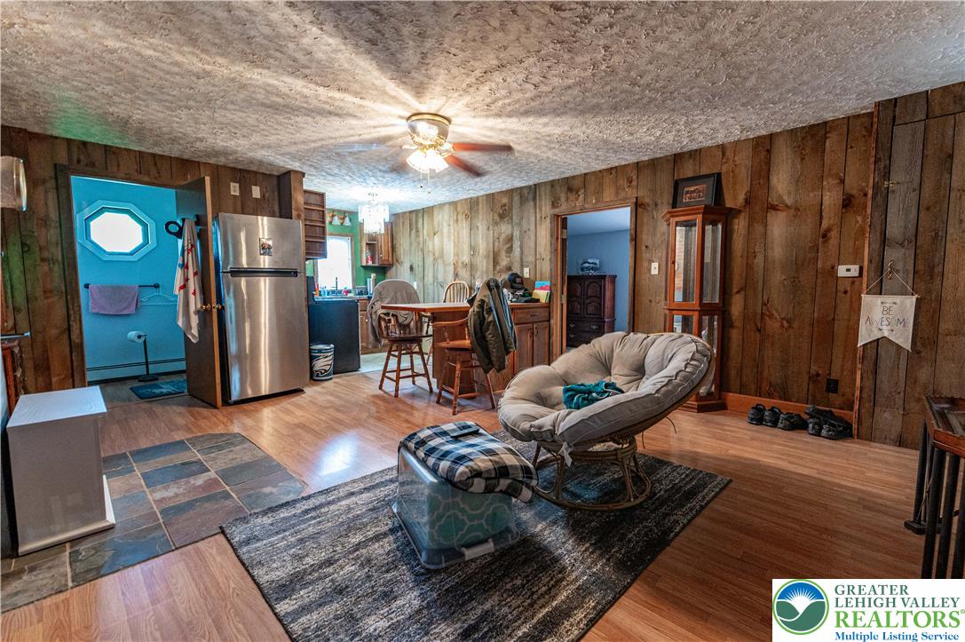 2485 Hieter Road Quakertown, PA 18951 - Photo 59 of 97 Hardwood floors and knotty pine walls frame a casual living space.