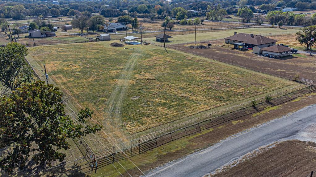 2121 Rock Creek Road Crowley, TX 76036 - Photo 8 of 22 a view of a yard with an outdoor space