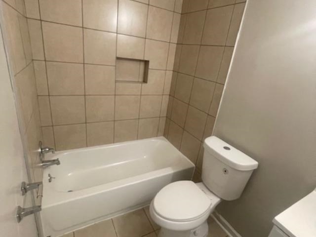 48 South Bristol Road Marion, AR 72364 - Photo 13 of 18 a white toilet and tub sitting next to a bathroom sink