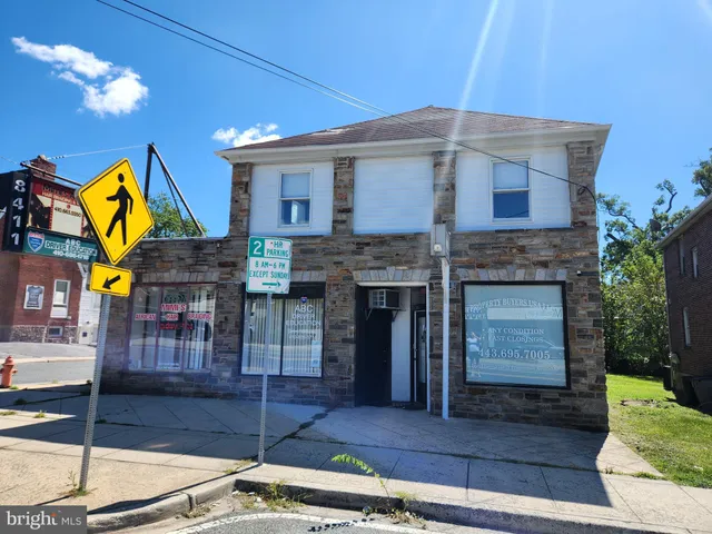 a front view of a house with street