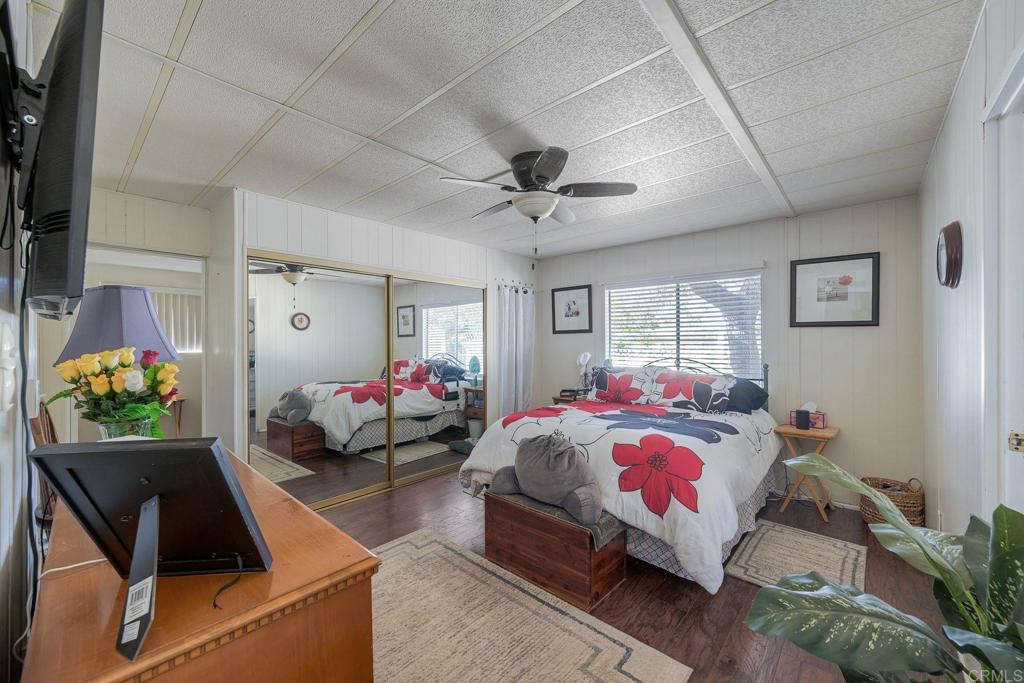 18218 Paradise Mountain Road Valley Center, CA 92082 - Photo 23 of 34 a bedroom with bed and window