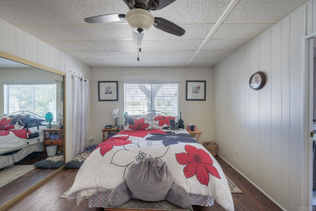 18218 Paradise Mountain Road Valley Center, CA 92082 - Photo 24 of 34 a bed room with a bed and a window