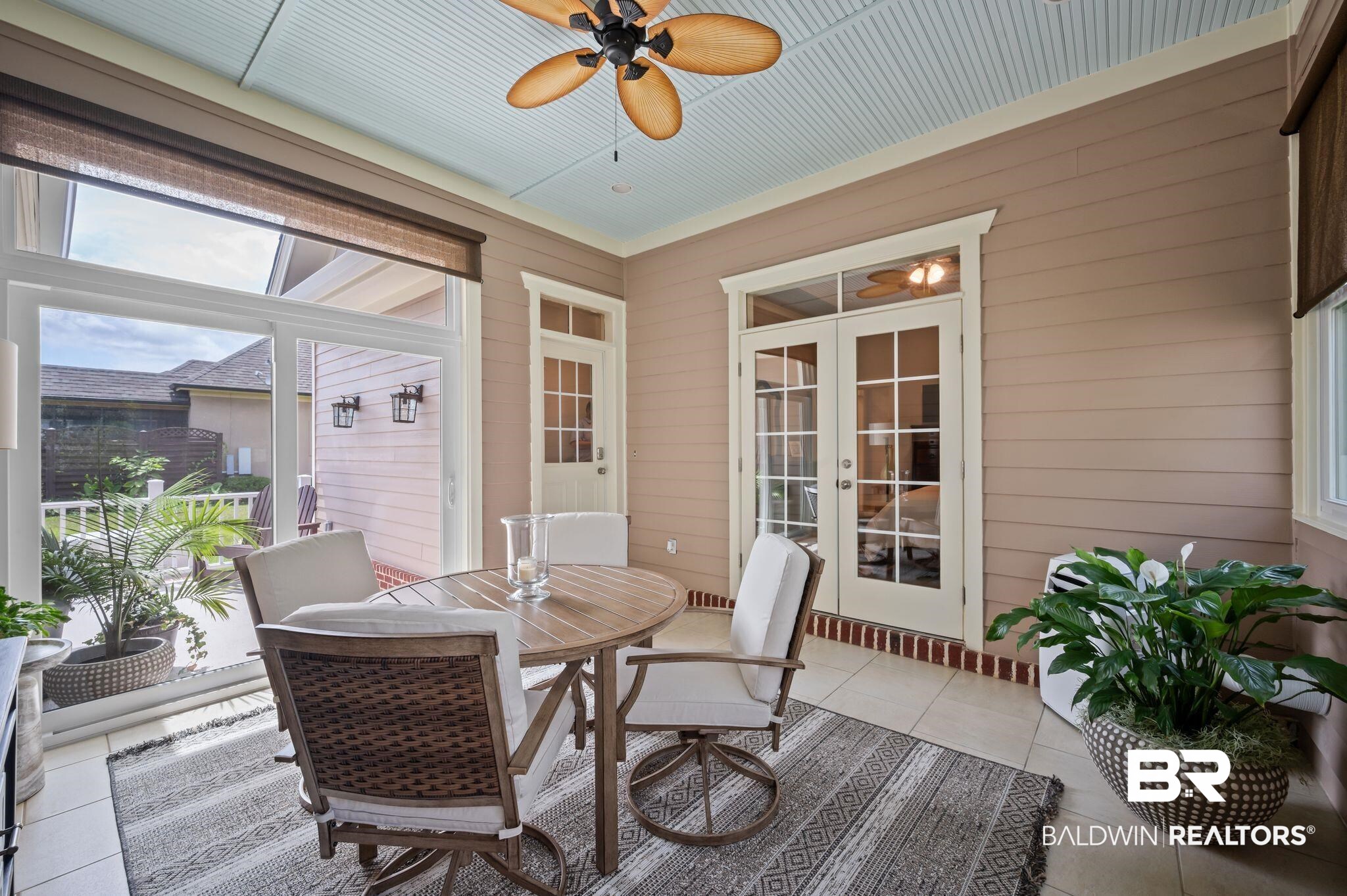 905 Buttercup Lane Foley, AL 36535 - Photo 35 of 47 Sunroom with french doors, ceiling fan, and plenty of natural light