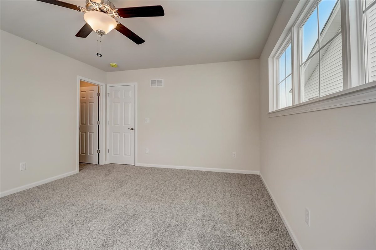 715 Station Boulevard Elburn, IL 60119 - Photo 16 of 33 a view of an empty room with a window