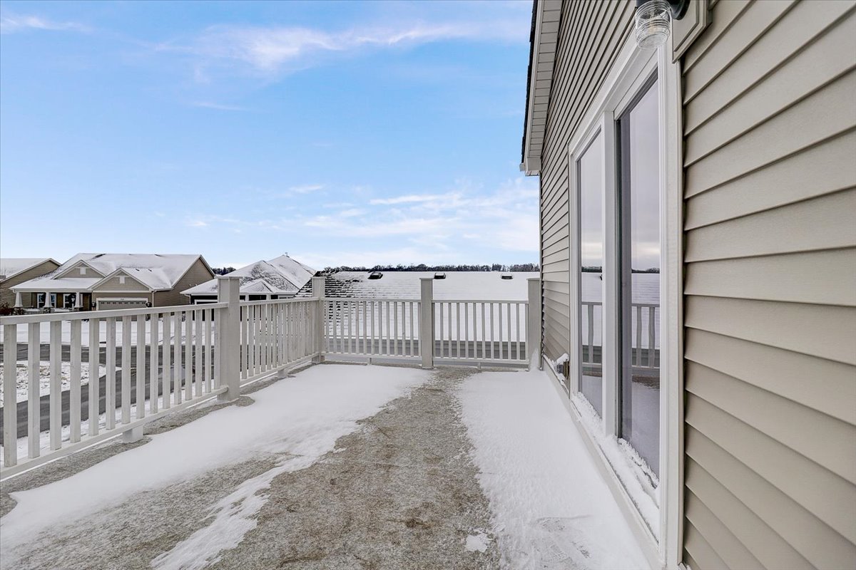 715 Station Boulevard Elburn, IL 60119 - Photo 32 of 33 a view of a balcony with a floor to ceiling window