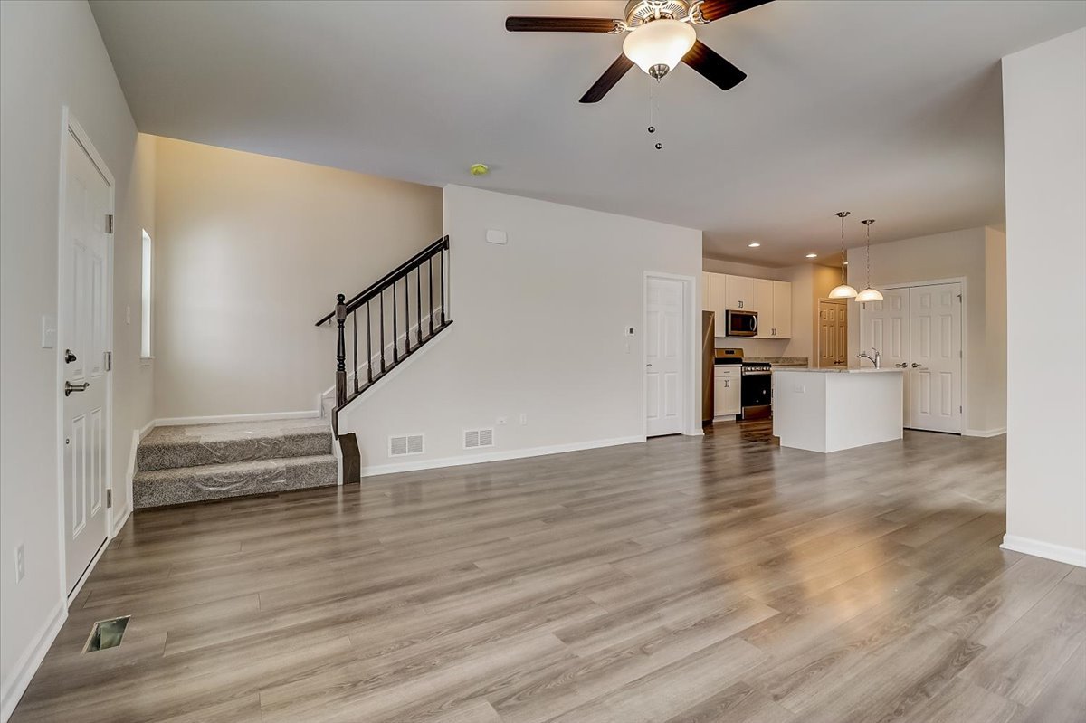 715 Station Boulevard Elburn, IL 60119 - Photo 4 of 33 a view of a livingroom with a hardwood floor