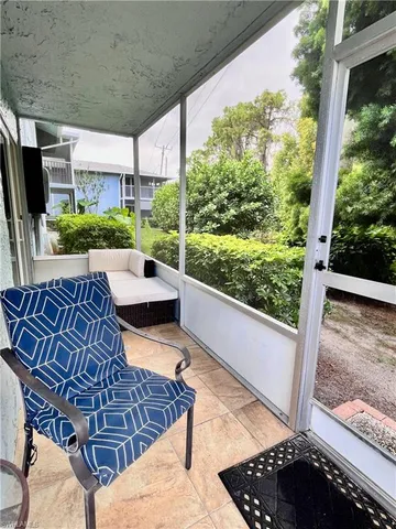 a view of a back yard from a patio