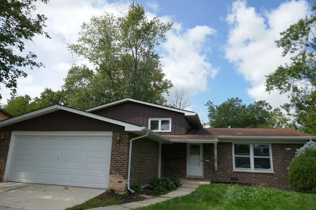 front view of house with a yard