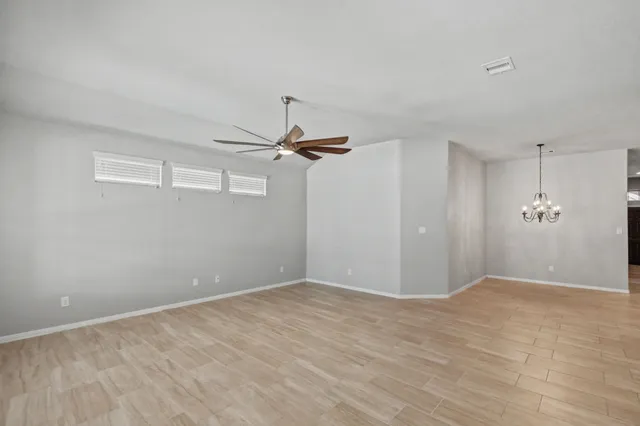 a view of a big room with carpet