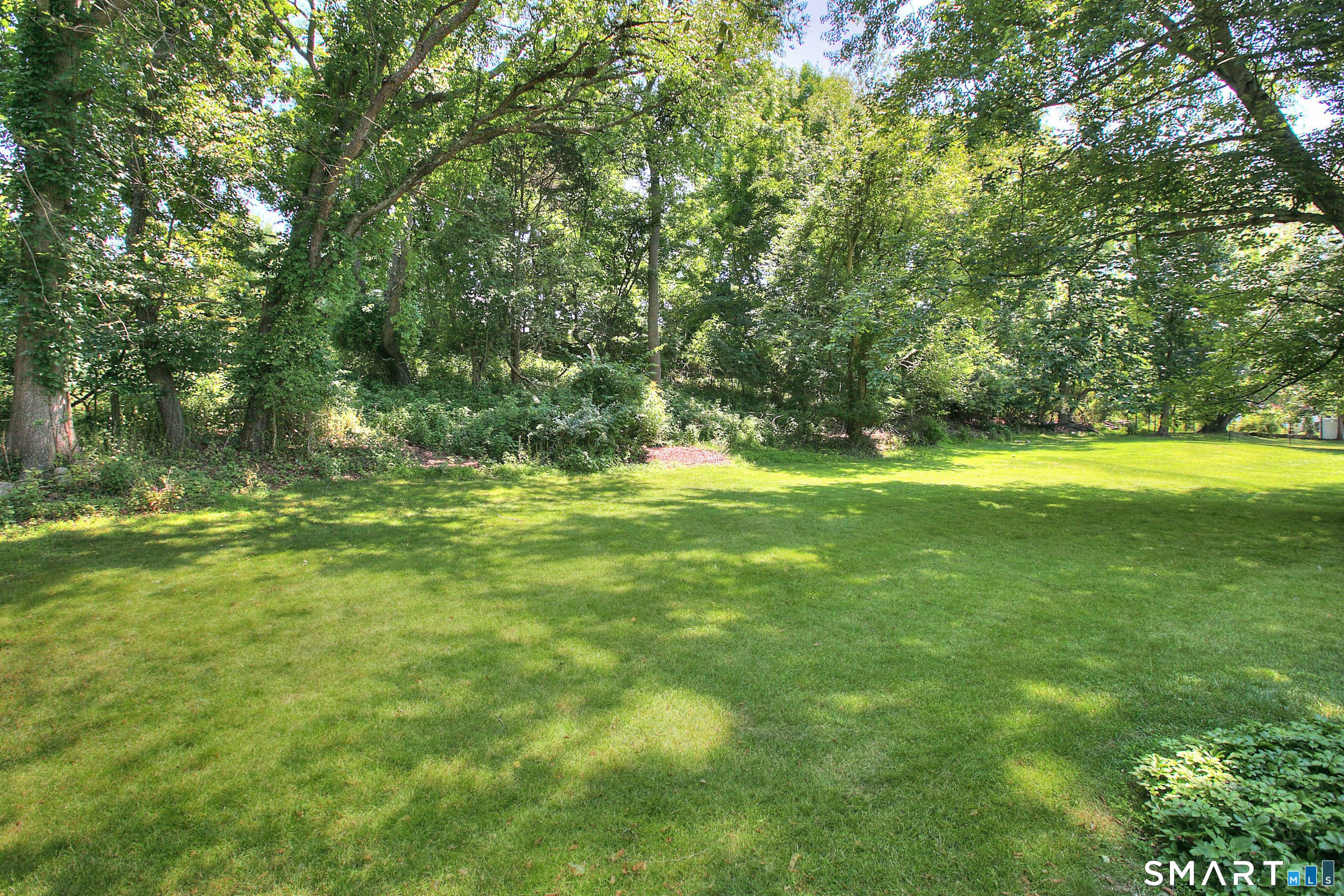 5 Guyer Road Westport, CT 06880 - Photo 5 of 30 Level yard great for outdoor entertainment.