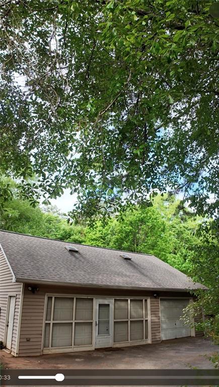 2148 Castleway Court Jonesboro, GA 30236 - Photo 2 of 7 a backyard of a house with lots of green space