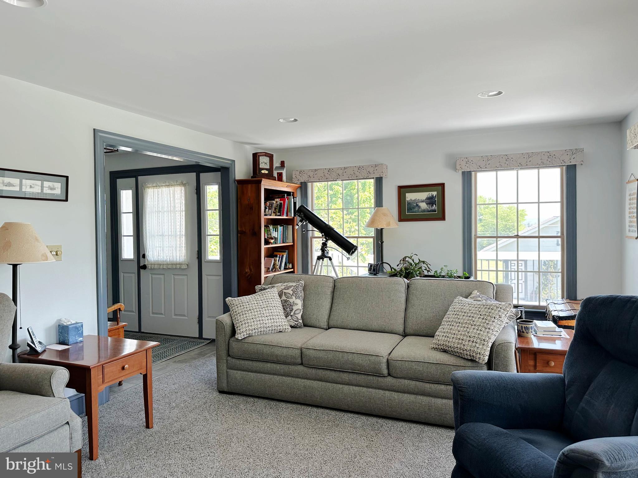 2382 Bergey Road Harleysville, PA 19438 - Photo 21 of 52 a living room with furniture and a window