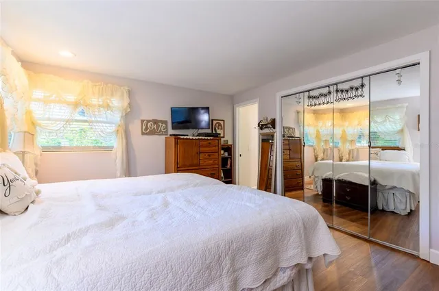 a bathroom with a shower toilet and a sink