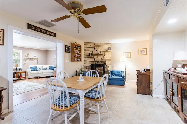 a room with water heater and wooden floor