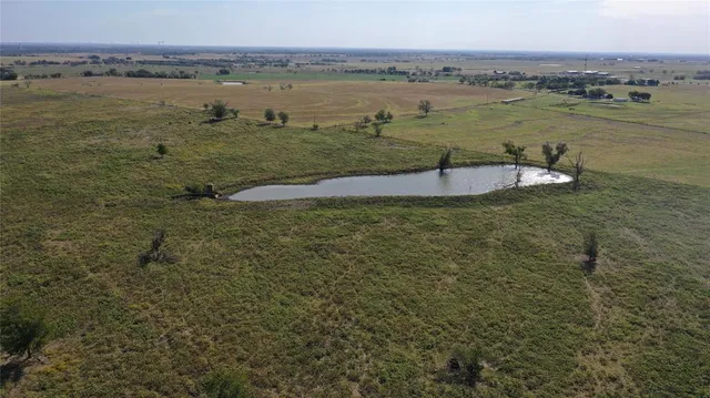 a view of a lake with a city
