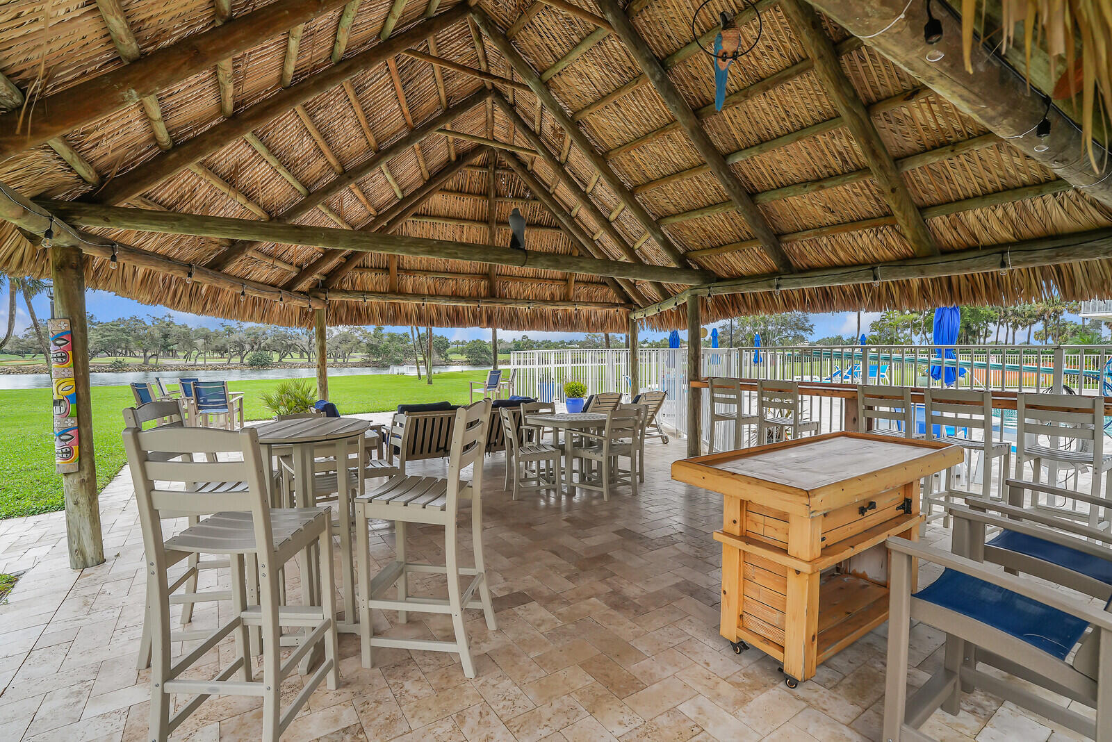 336 Golfview Road, Unit 1115 North Palm Beach, FL 33408 - Photo 34 of 40 Tiki entertaining area