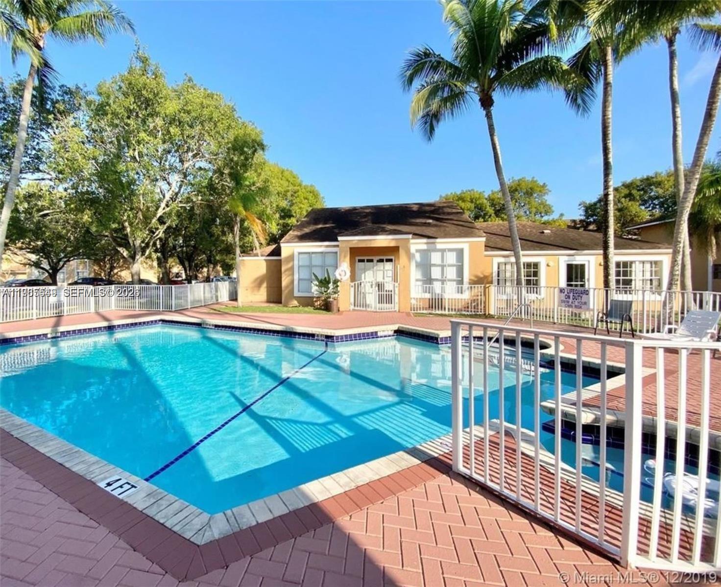 2255 Southwest 80th Terrace, Unit 2255 Miramar, FL 33025 - Photo 13 of 14 a view of a house with a patio
