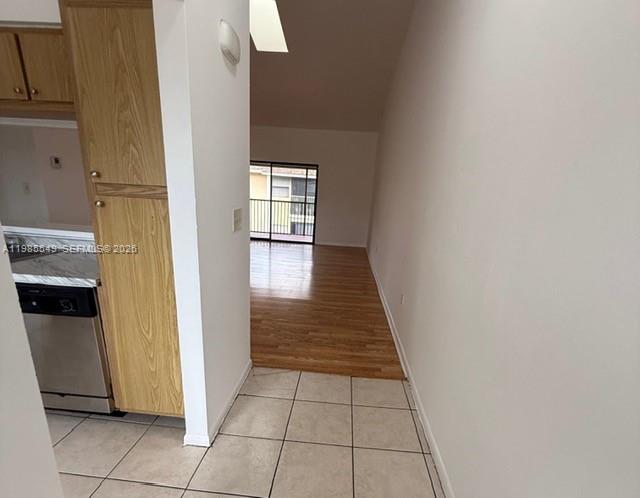 2255 Southwest 80th Terrace, Unit 2255 Miramar, FL 33025 - Photo 10 of 14 a view of a hallway with a white walls