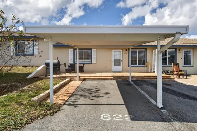 a view of a house with a swimming pool
