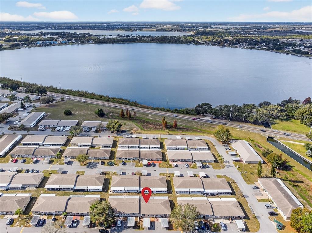 622 Ridge Terrace Winter Haven, FL 33881 - Photo 33 of 34 an aerial view of a residential building and lake view