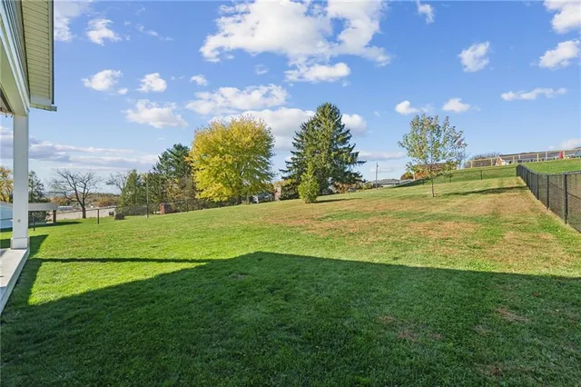a view of a golf course with a lake