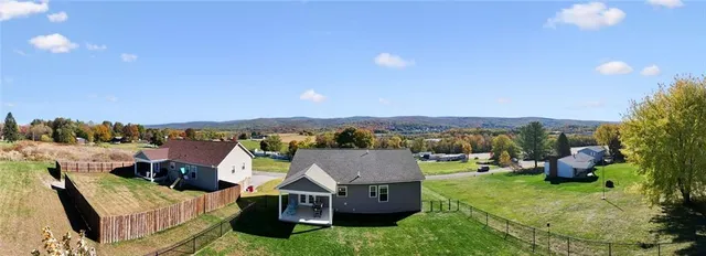 a view of houses with outdoor space and outdoor seating