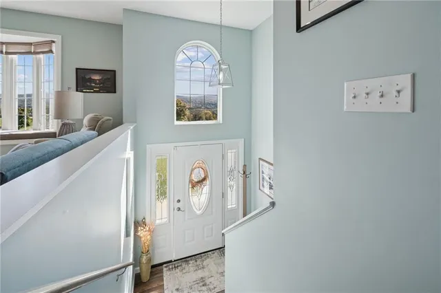 a view of a livingroom with furniture and window