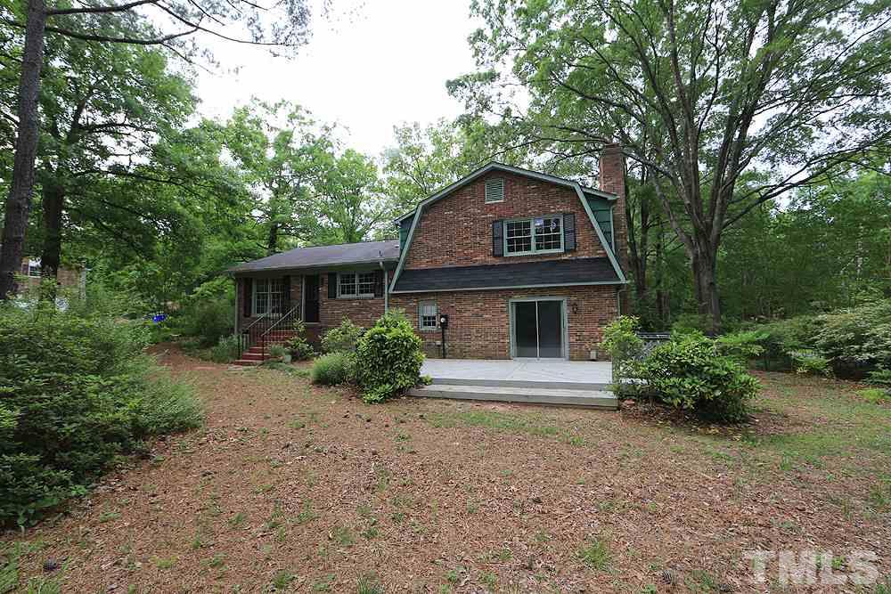 1933 Fountain Ridge Road Chapel Hill, NC 27517 - Photo 14 of 22 This large backyard has plenty of room for gardening, gathering and games!
