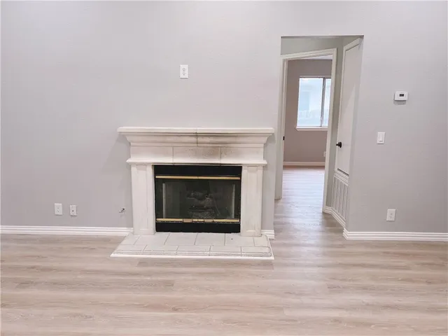 a living room with a fireplace