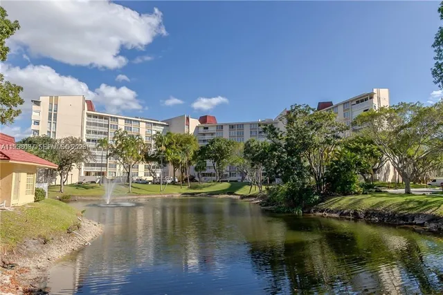 a view of a livingroom with furniture and staircase