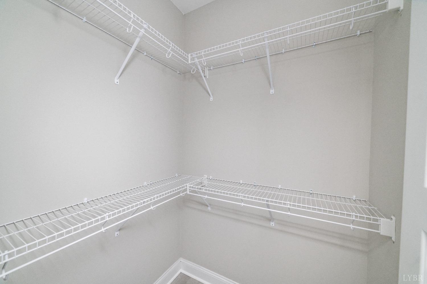 506 Bridge Tree Court Evington, VA 24550 - Photo 25 of 60 a view of a room with racks on the wall